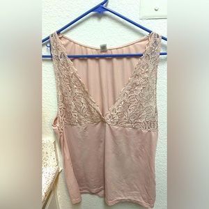 Pinkish colored shirt lace around the chest area very pretty brand:Pink 💕